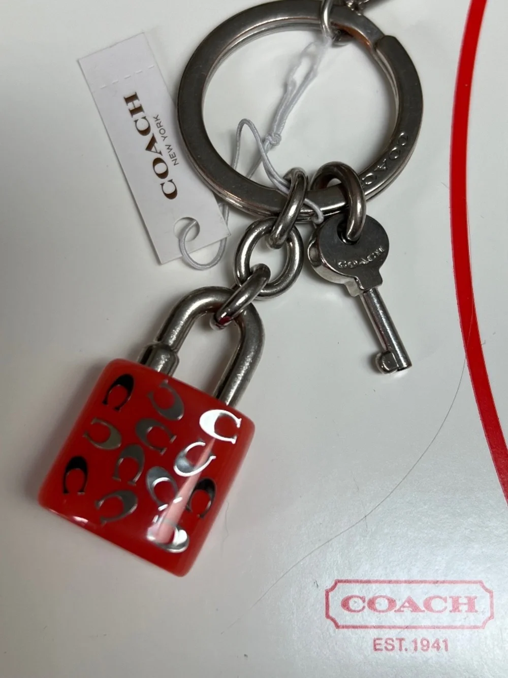 COACH LOCK AND KEY KEY RING  PURSE CHARM PINK AND SILVER NEW NWT (RETIRED) W/BOX